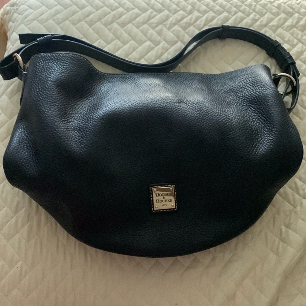 Black with red inside dooney and bourke purse